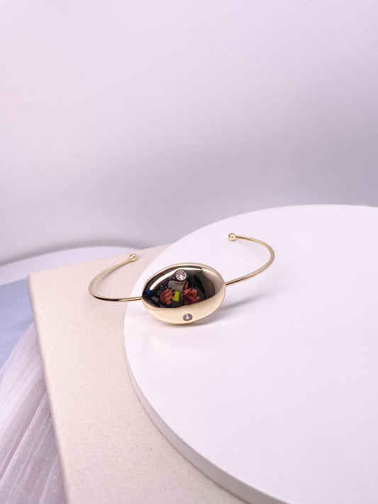 Bracelete oval liso com detalhe em zircônias