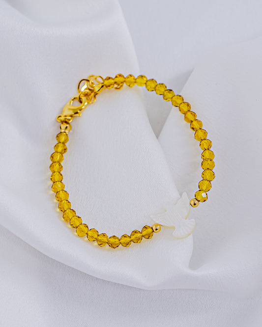 Pulseira Cristal Amarelo com Espírito Santo Madrepérola